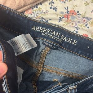 American eagle ripped blue jeans